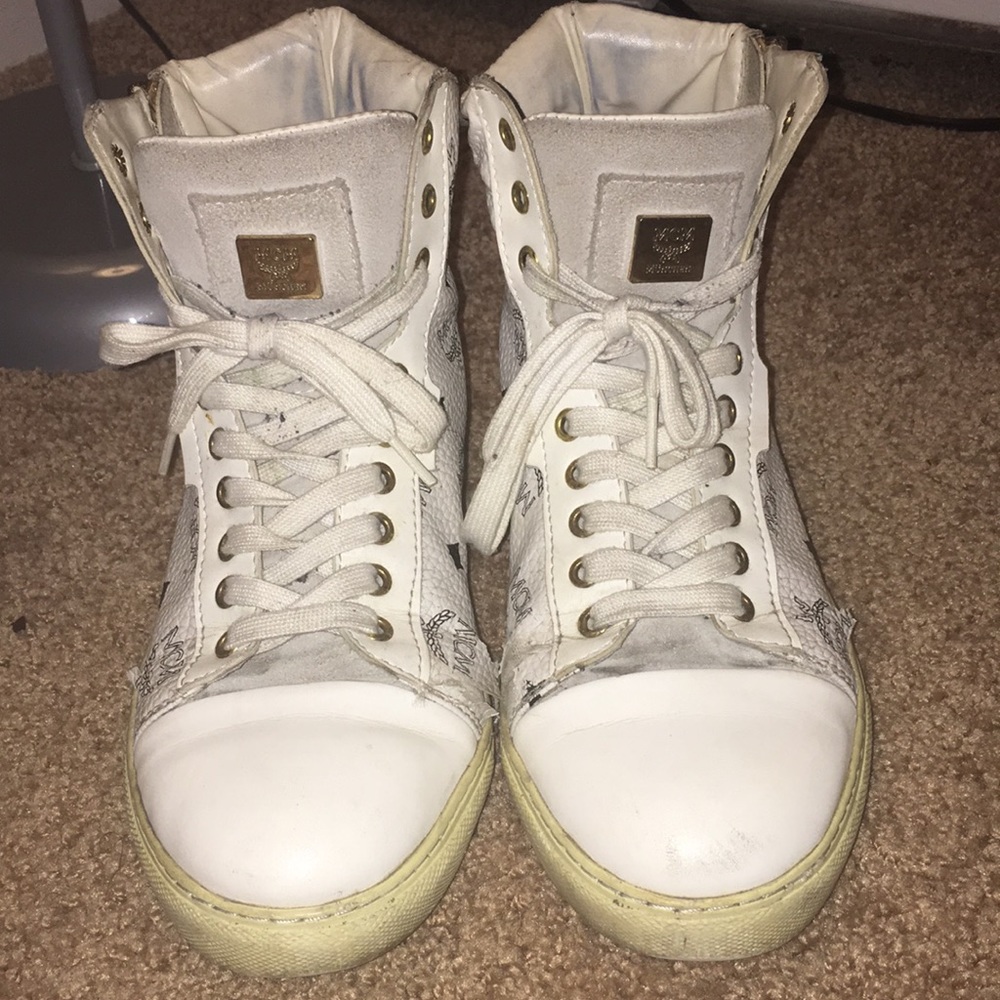 White MCM High top sneakers w/ gold zipper.